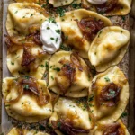Crispy Sheet Pan Pierogies with Caramelized Onions & Chipotle Cream 2 Sheet Pan Pierogies with Caramelized Onions and Chipotle Sour Cream